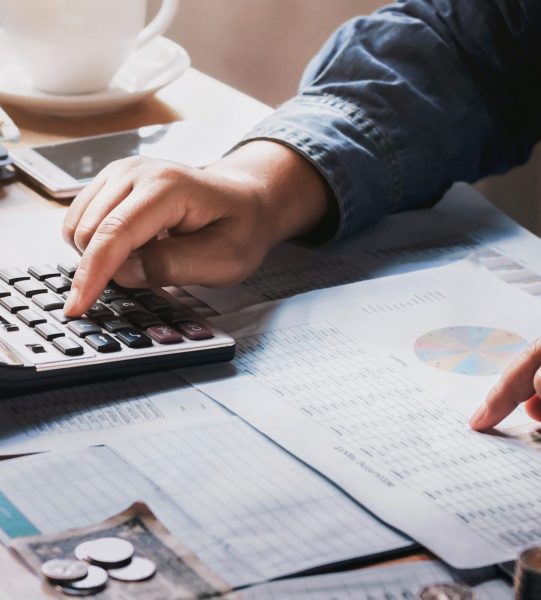 businessman using calculator for calculate budget. concept finance
