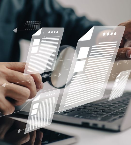 Man inspects paper with magnifying lens. Business analysis, auditing, professional document review, inquiry, and inspection are all concepts that are used in business analysis.