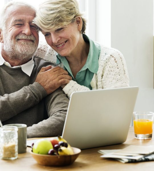 Modern grandparents chatting with their granddaughter